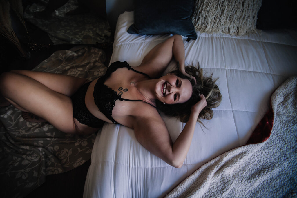 On the fence about booking your boudoir photography session? Here's how a session will make you feel more empowered. 