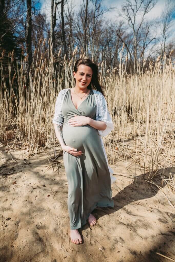 pregnant woman walking through park